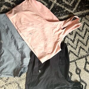 Fabletics single shoulder yoga tops. Set of  3. Black, pink, grey blue.